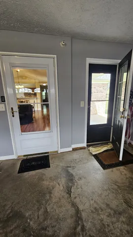 a view of a livingroom with a flat screen tv