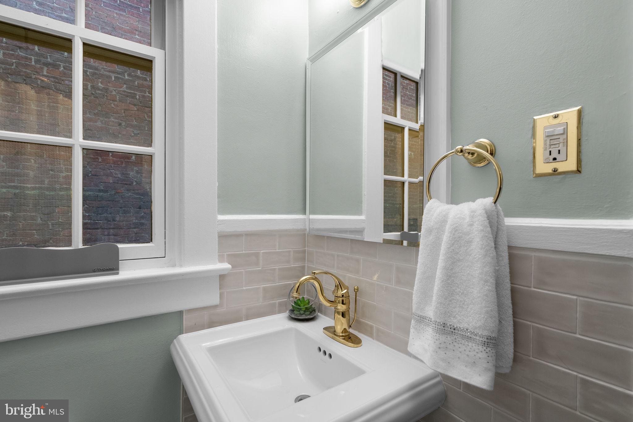 1705 Lanier Place Northwest, Unit 204 Washington, DC 20009 - Photo 26 of 26 Updated Bathroom