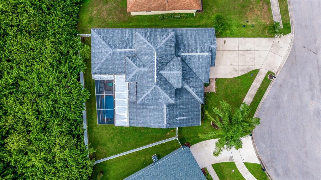 205 Bengal Circle Oldsmar, FL 34677 - Photo 39 of 40 an aerial view of a house with a garden