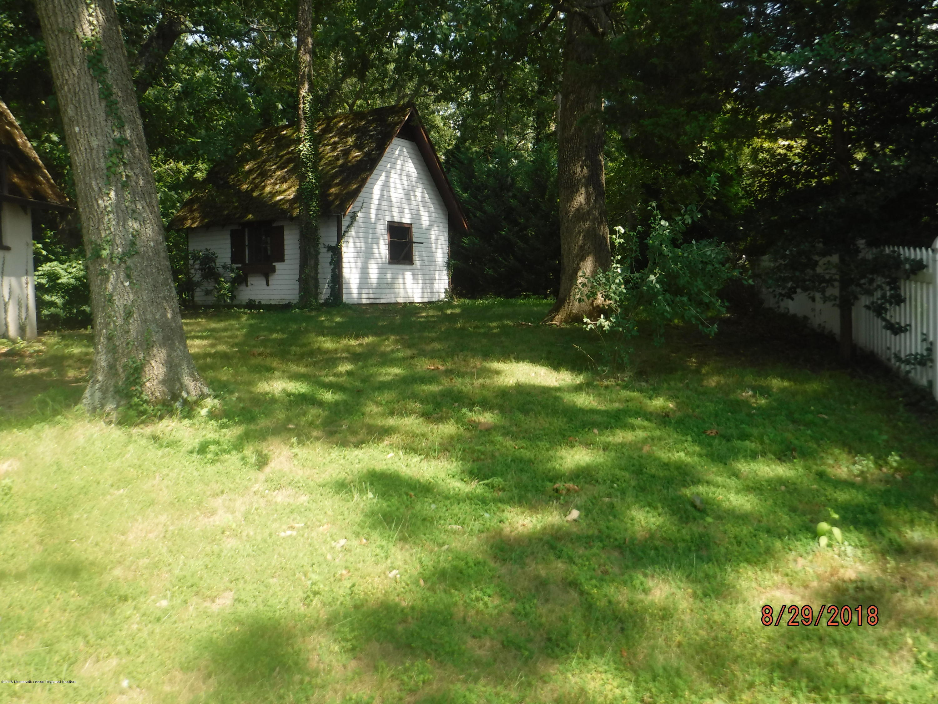 2413 Riverside Terrace Manasquan, NJ 08736 - Photo 12 of 46 yard with garage