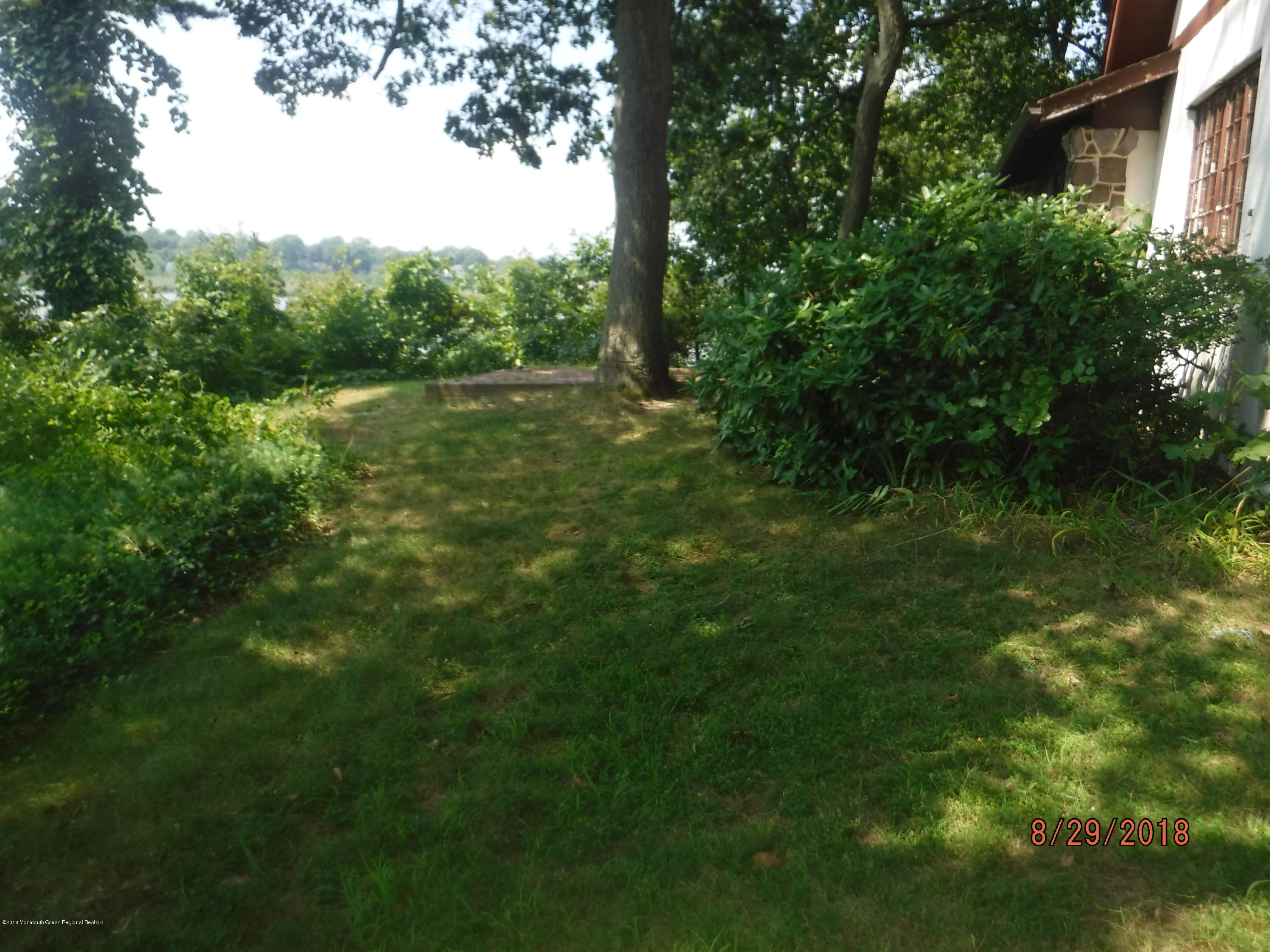 2413 Riverside Terrace Manasquan, NJ 08736 - Photo 18 of 46 left yard