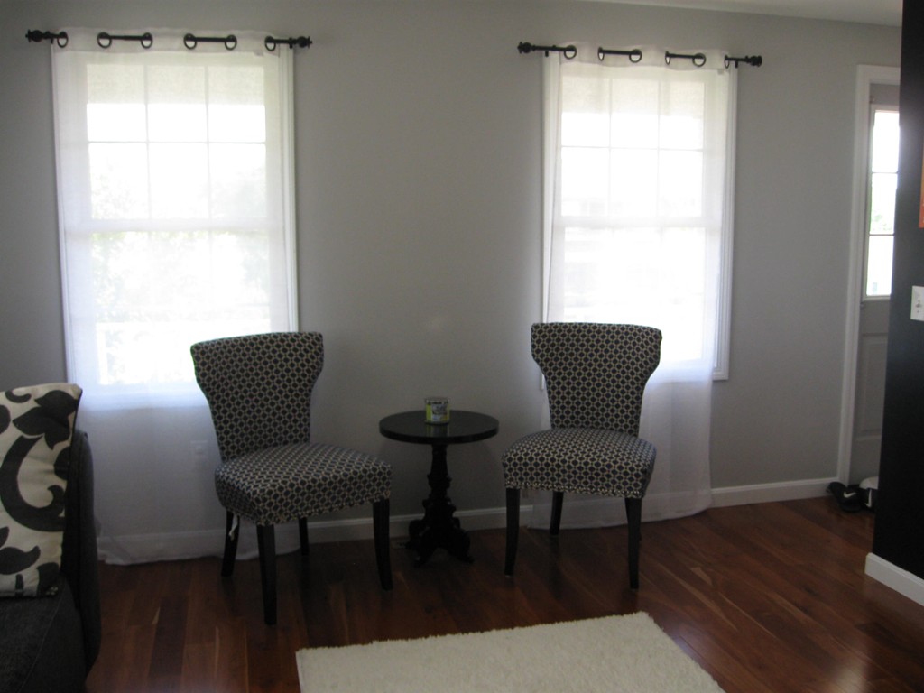 56 Gates Avenue Springfield, MA 01118 - Photo 13 of 30 a living room with furniture and a window