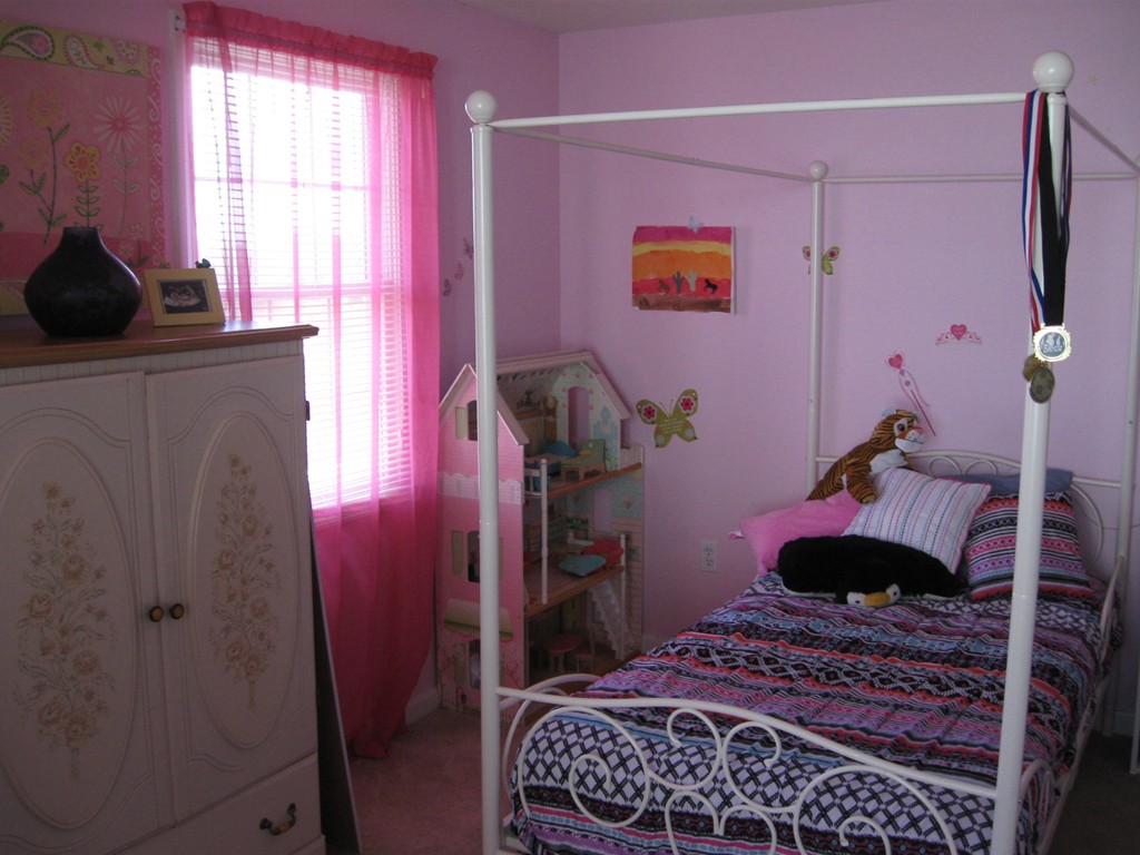 56 Gates Avenue Springfield, MA 01118 - Photo 23 of 30 a bedroom with a bed and a window