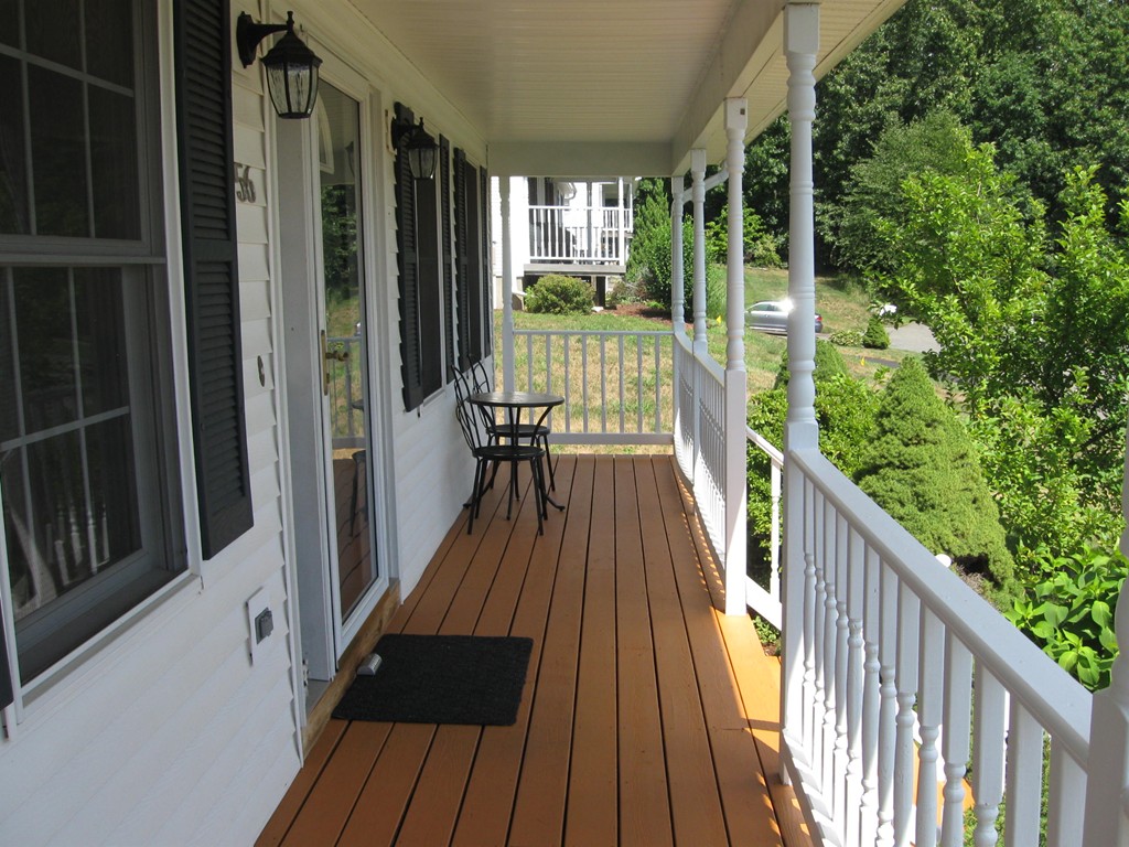 56 Gates Avenue Springfield, MA 01118 - Photo 25 of 30 a view of balcony with wooden floor