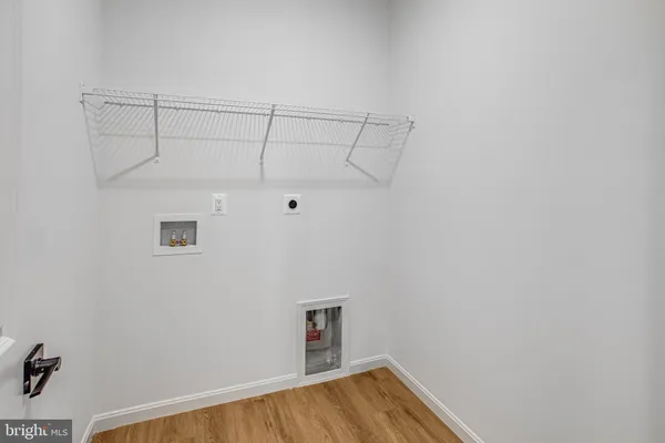 a view of a room with racks on the wall