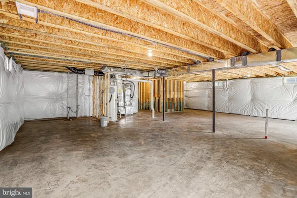 a big house with large windows and a yard