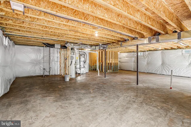 a big house with large windows and a yard