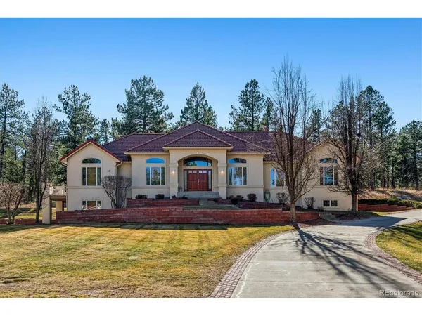 a view of house with outdoor space