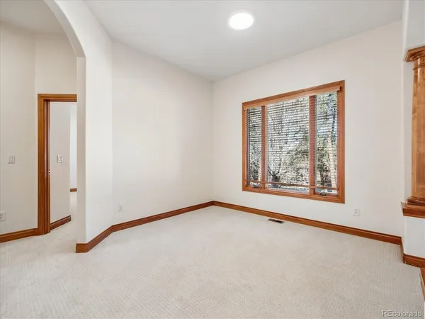 an empty room with window