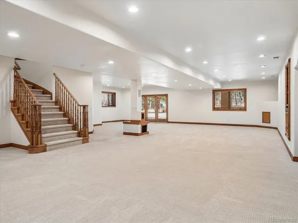 an empty room with white walls and white walls