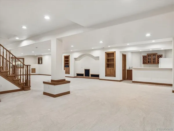 a kitchen with stainless steel appliances a refrigerator and a stove