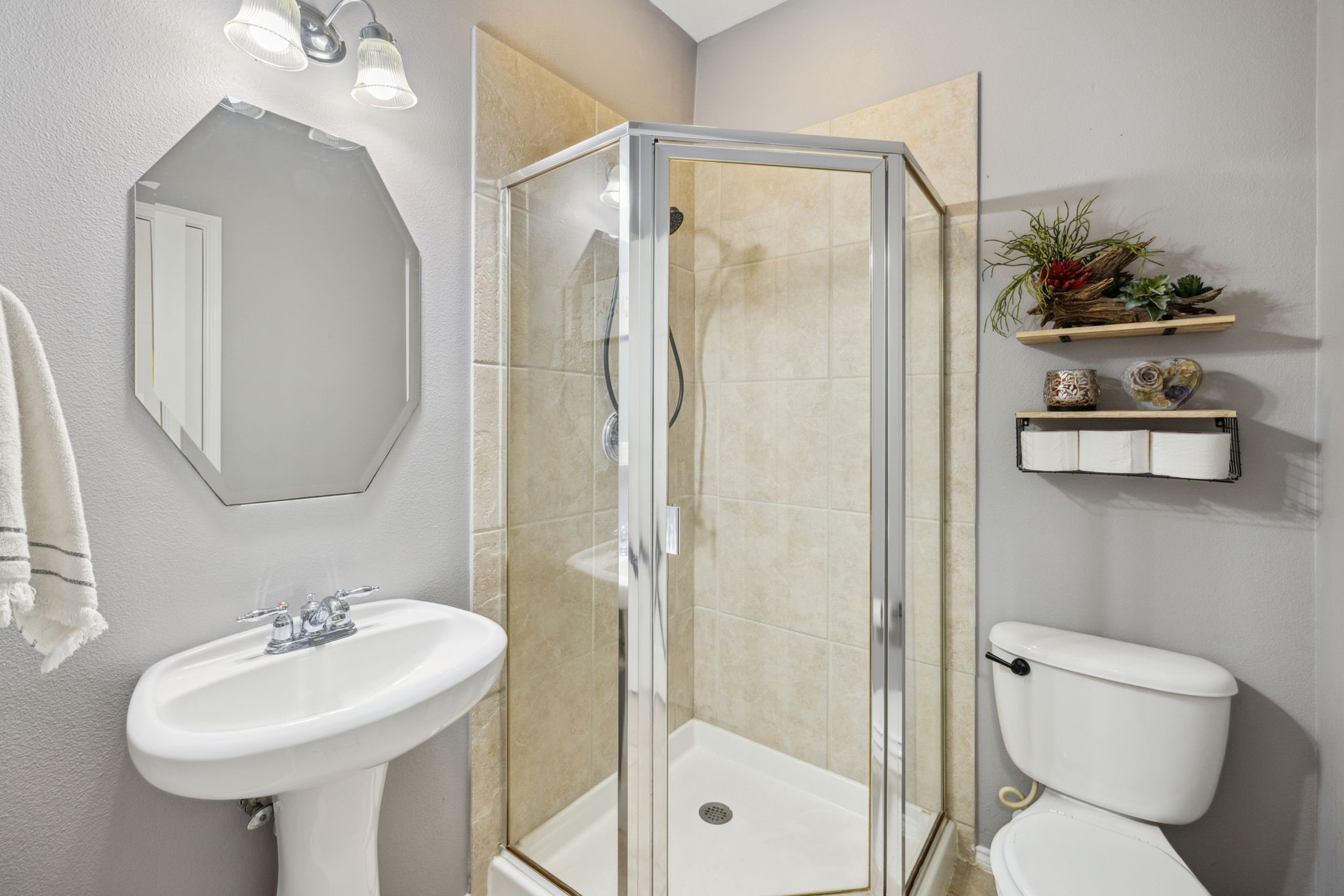 3526 Azalea Sands Drive Spring, TX 77386 - Photo 20 of 39 a bathroom with a sink toilet and shower