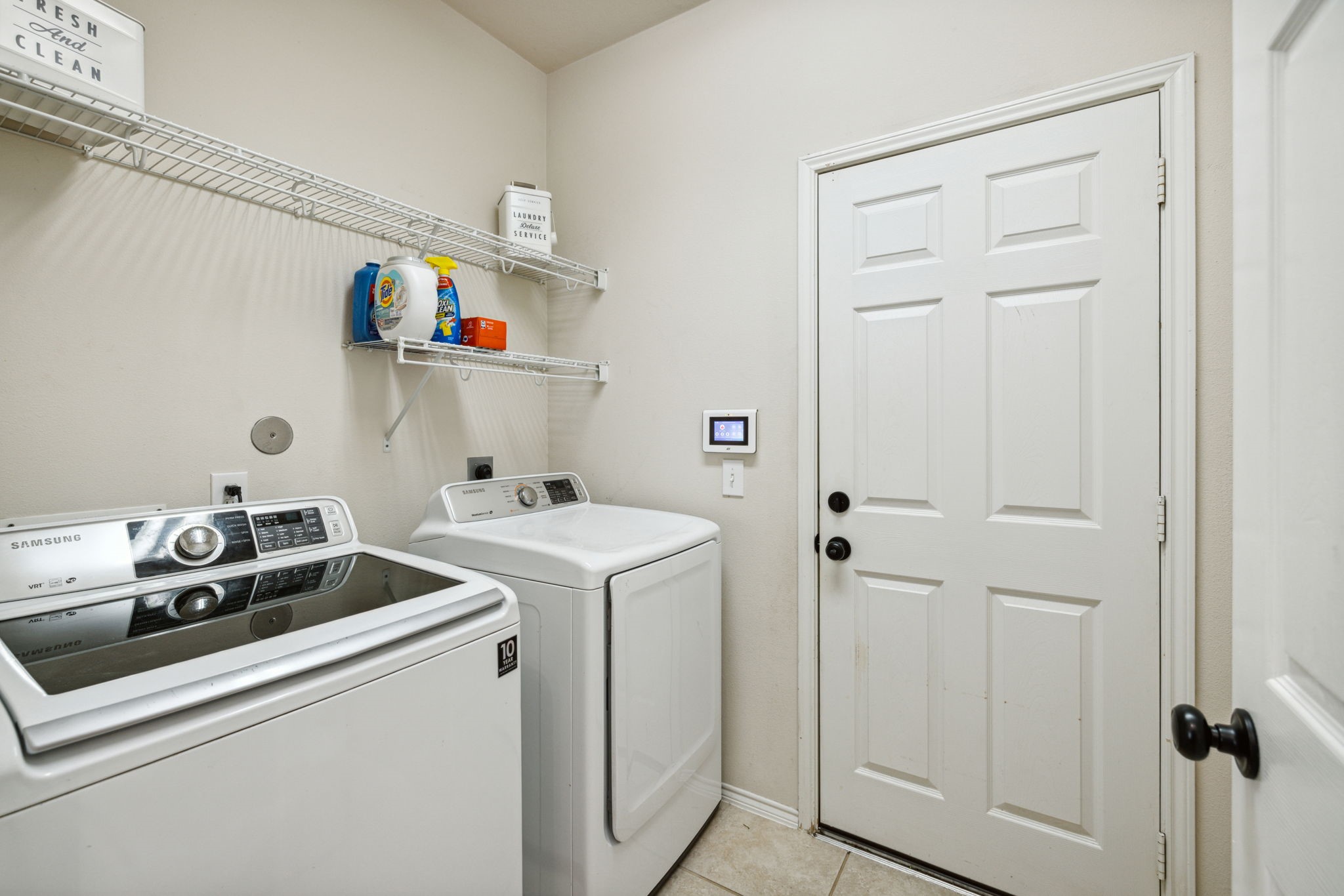 3526 Azalea Sands Drive Spring, TX 77386 - Photo 21 of 39 a utility room with dryer and washer