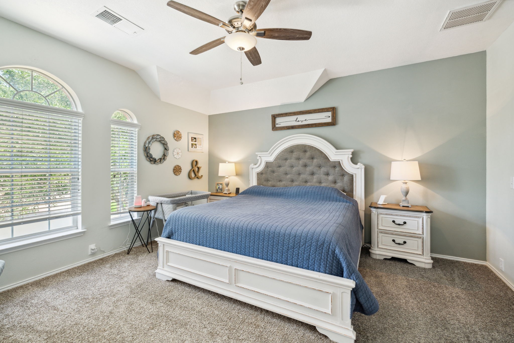 3526 Azalea Sands Drive Spring, TX 77386 - Photo 25 of 39 a bedroom with a bed dresser and a window