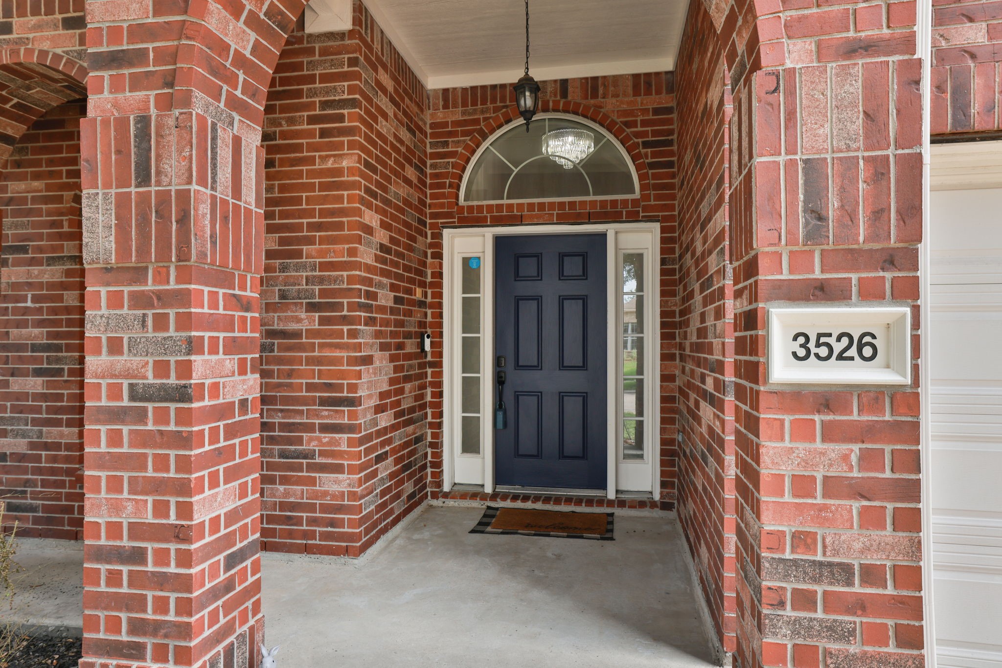 3526 Azalea Sands Drive Spring, TX 77386 - Photo 3 of 39 a front view of a building with entryway