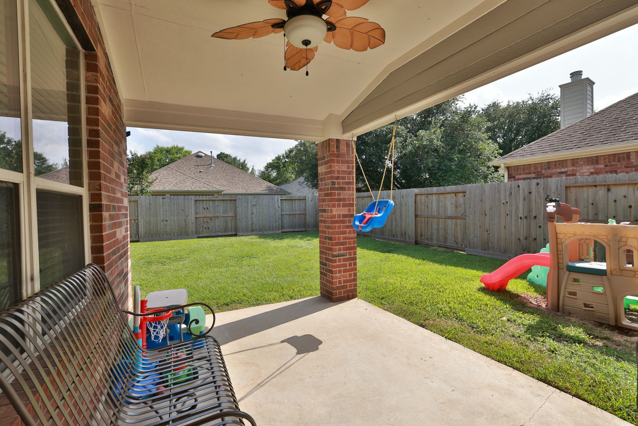 3526 Azalea Sands Drive Spring, TX 77386 - Photo 33 of 39 a view of a backyard with a garden and plants