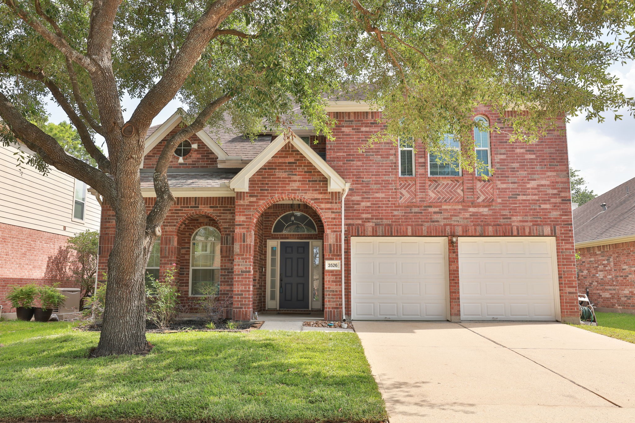 3526 Azalea Sands Drive Spring, TX 77386 - Photo 38 of 39 a front view of a house with yard