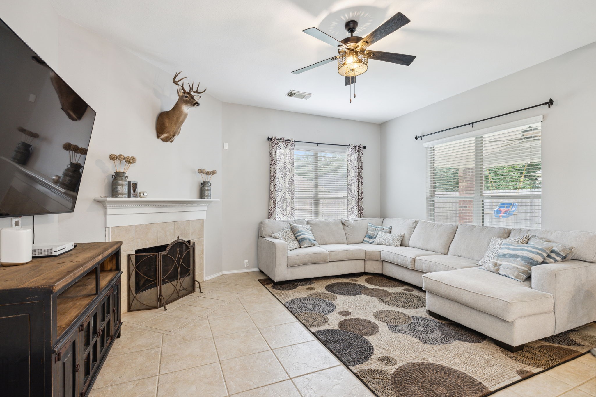 3526 Azalea Sands Drive Spring, TX 77386 - Photo 10 of 39 a living room with furniture and a flat screen tv