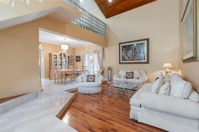 a view of staircase with white walls and a window