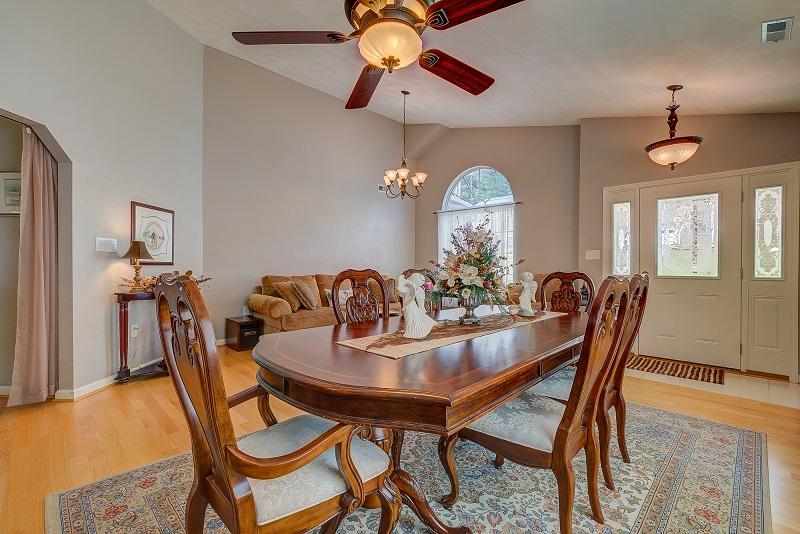 4248 Daugherty Road Salem, VA 24153 - Photo 8 of 27 a dining room with furniture and chandelier