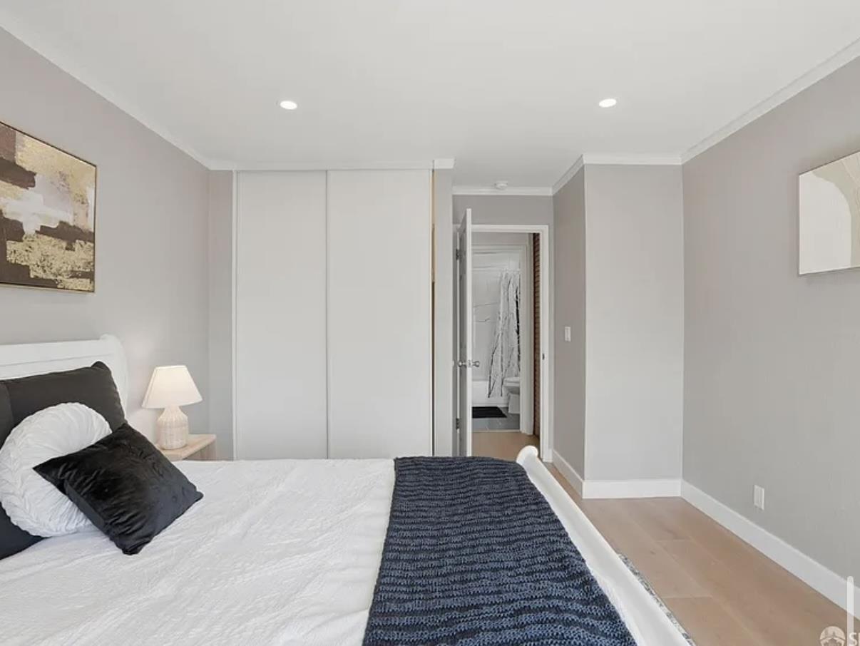 4081 Clayton Road, Unit 235 Concord, CA 94521 - Photo 13 of 19 a bedroom with a bed and a walk in closet