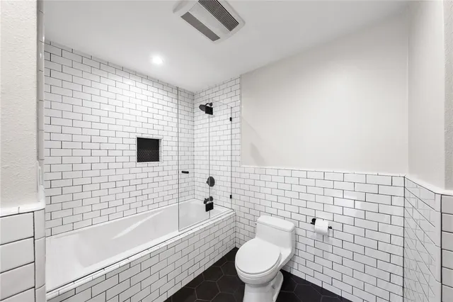 an aerial view of residential building with parking space