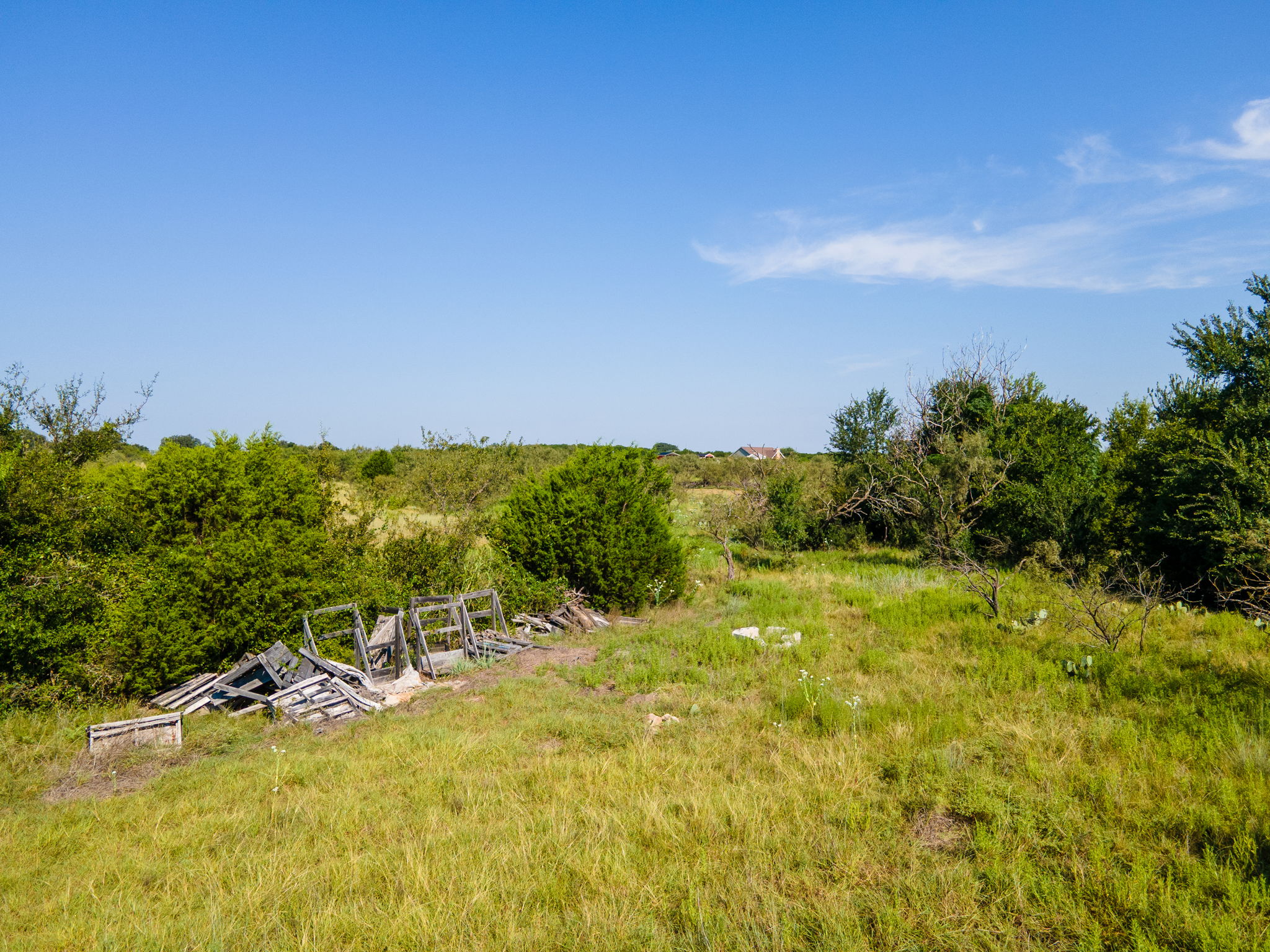 0 1276th Prairie Lampasas, TX 76550 - Photo 6 of 19 a view of a yard with an ocean and trees in the background