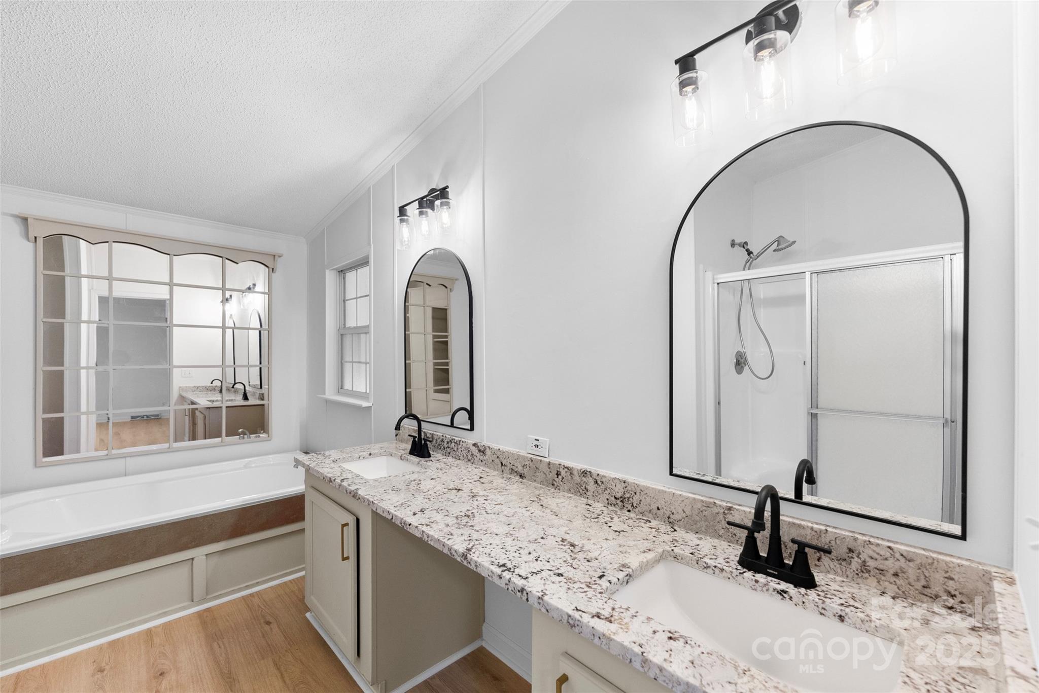 2121 Hephzibah Church Road Bessemer City, NC 28016 - Photo 17 of 41 a bathroom with a granite countertop sink and a large mirror