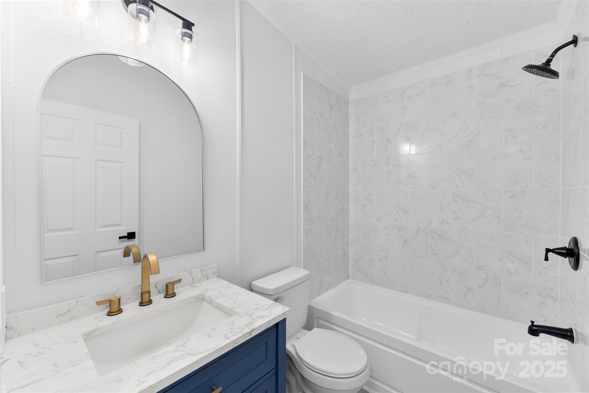 2121 Hephzibah Church Road Bessemer City, NC 28016 - Photo 20 of 41 a bathroom with a sink a toilet and bathtub