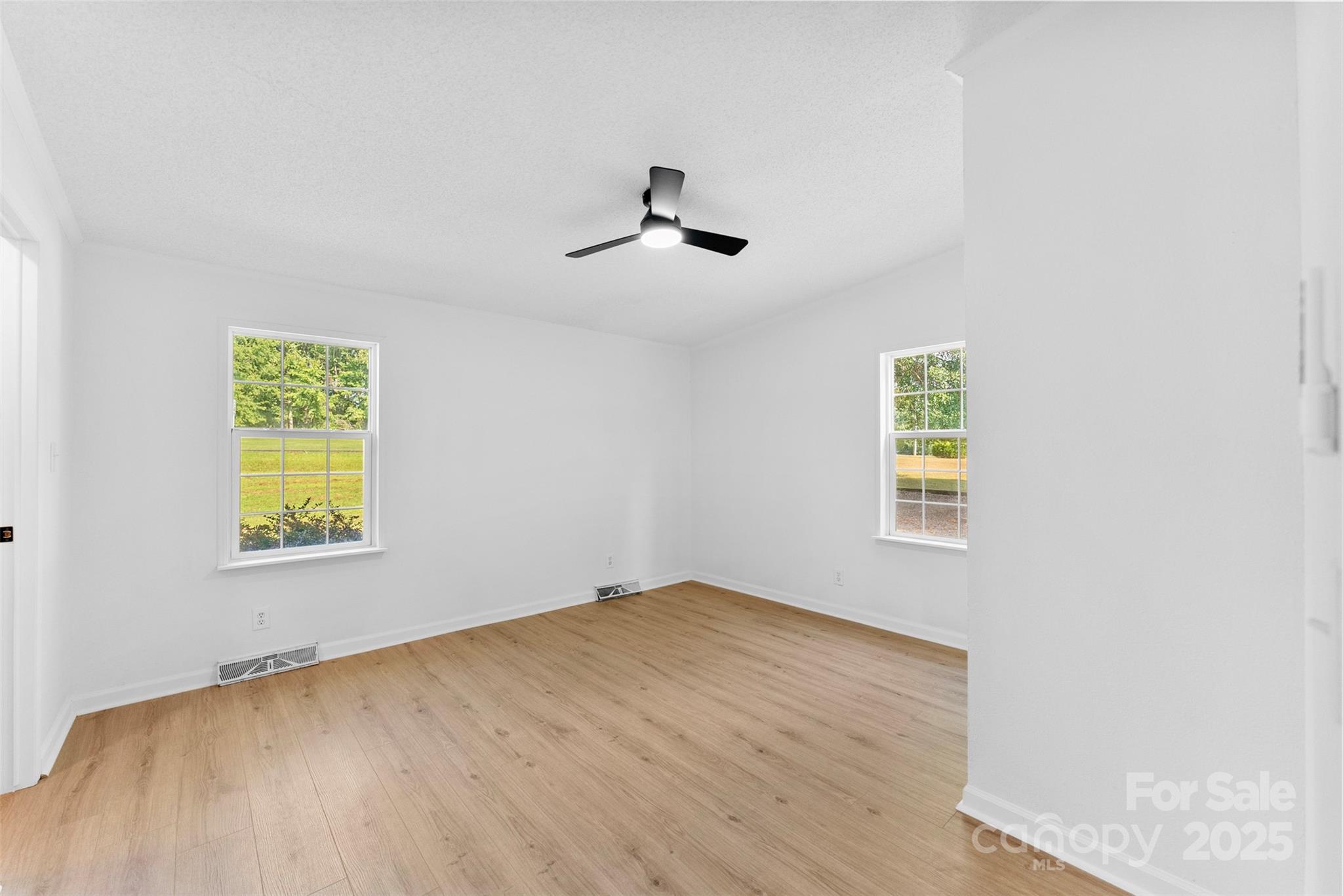 2121 Hephzibah Church Road Bessemer City, NC 28016 - Photo 21 of 41 a view of an empty room with a window