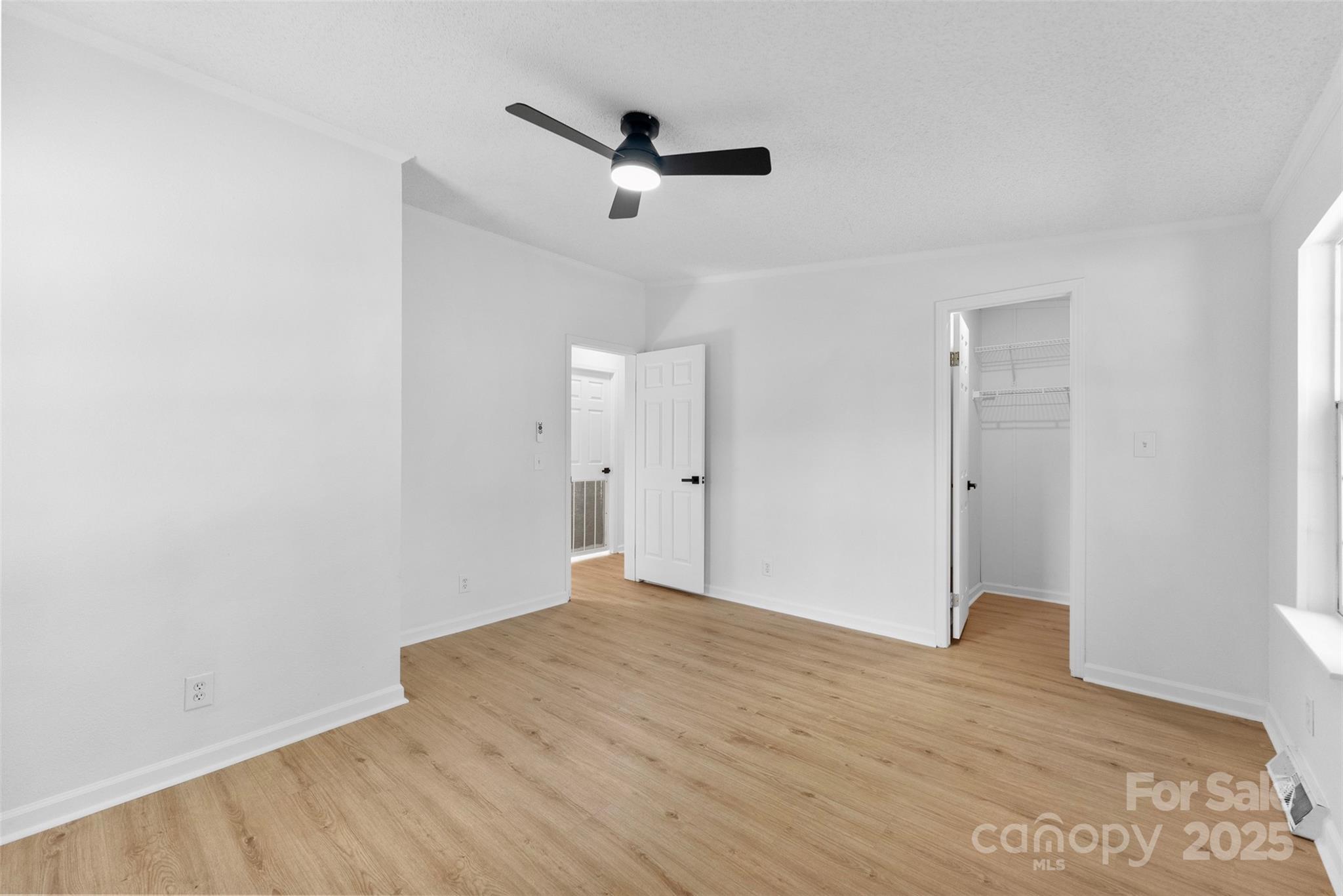 2121 Hephzibah Church Road Bessemer City, NC 28016 - Photo 23 of 41 a view of empty room with wooden floor