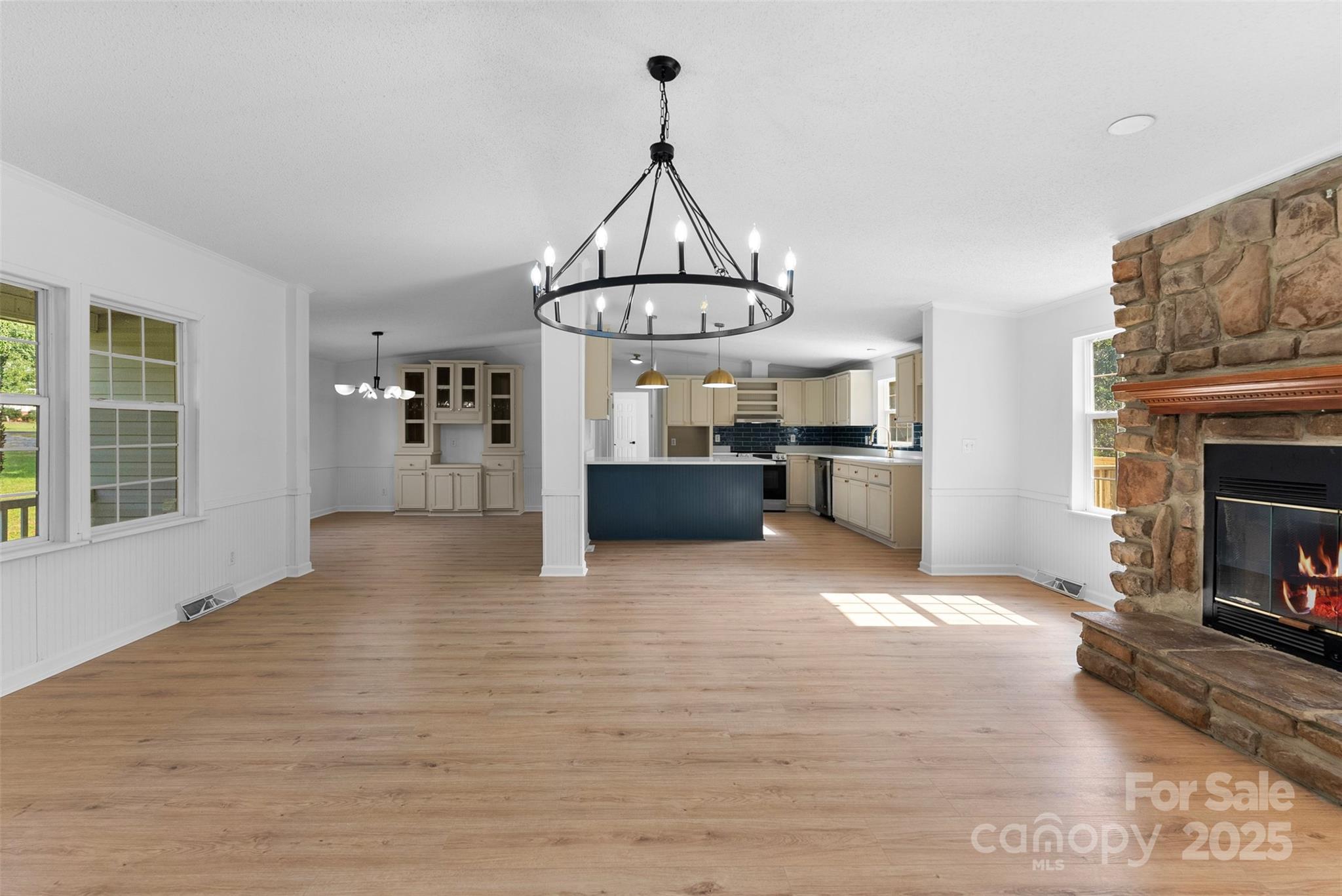2121 Hephzibah Church Road Bessemer City, NC 28016 - Photo 3 of 41 a view of a livingroom with a fireplace a window and wooden floor