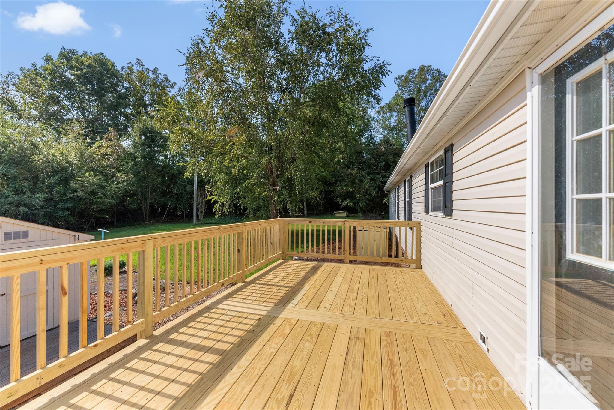 2121 Hephzibah Church Road Bessemer City, NC 28016 - Photo 31 of 41 a view of balcony with wooden floor and fence