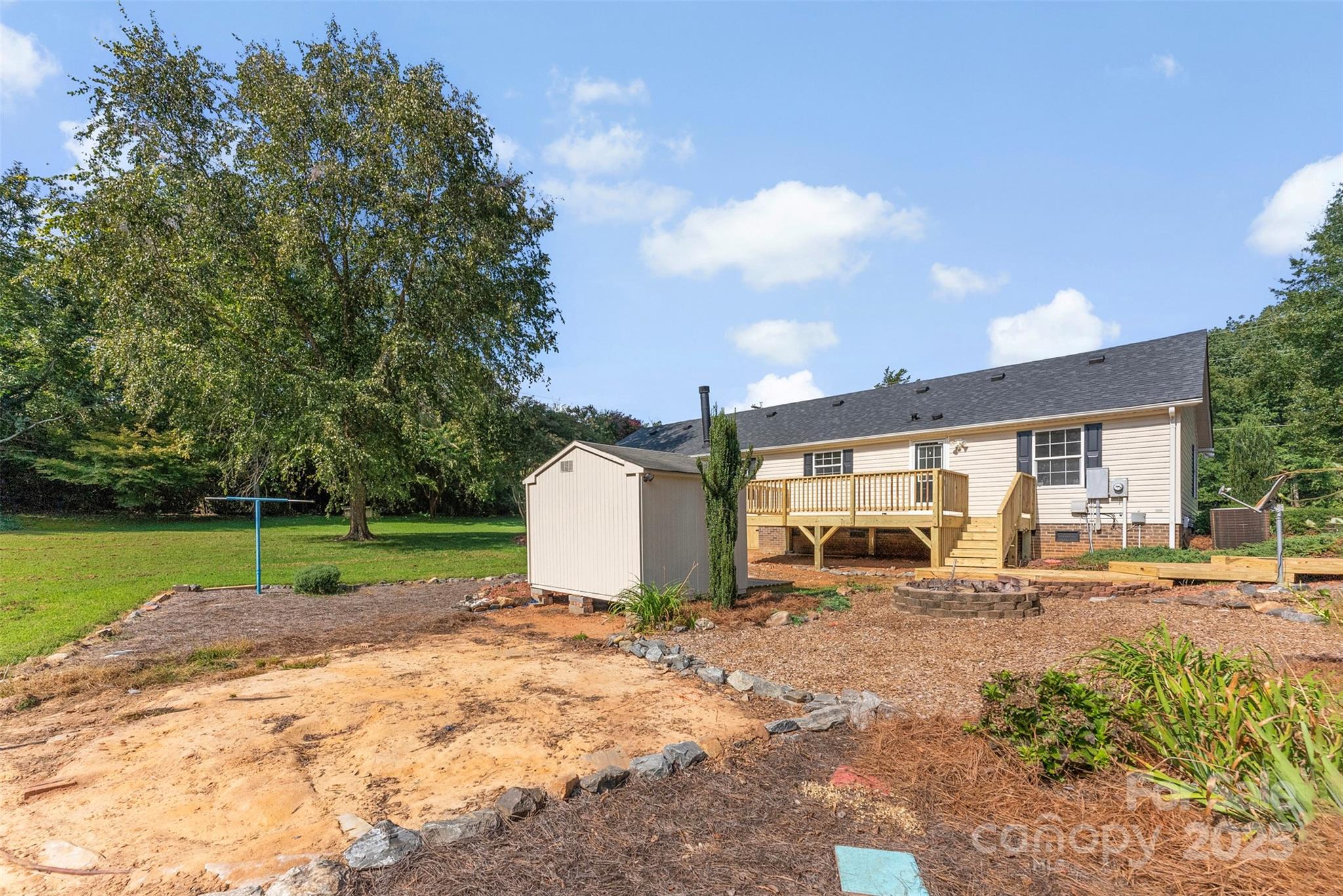 2121 Hephzibah Church Road Bessemer City, NC 28016 - Photo 36 of 41 a view of a house with a yard