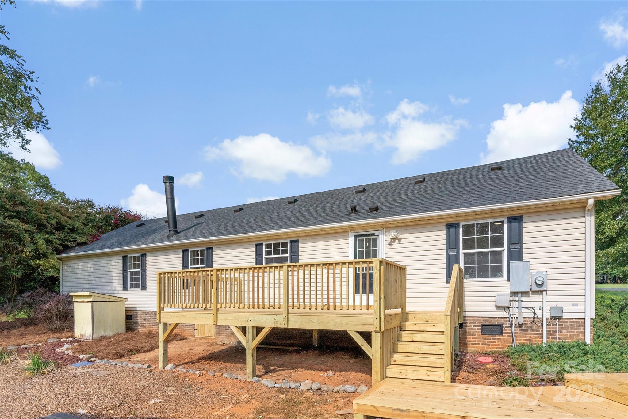 2121 Hephzibah Church Road Bessemer City, NC 28016 - Photo 38 of 41 a front view of a house with a patio