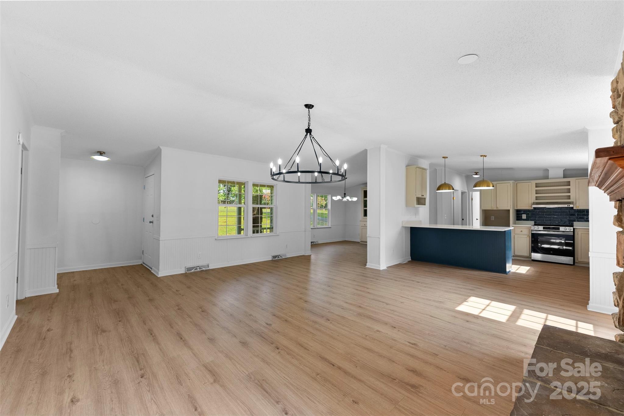 2121 Hephzibah Church Road Bessemer City, NC 28016 - Photo 4 of 41 a view of a kitchen with wooden floor and a kitchen