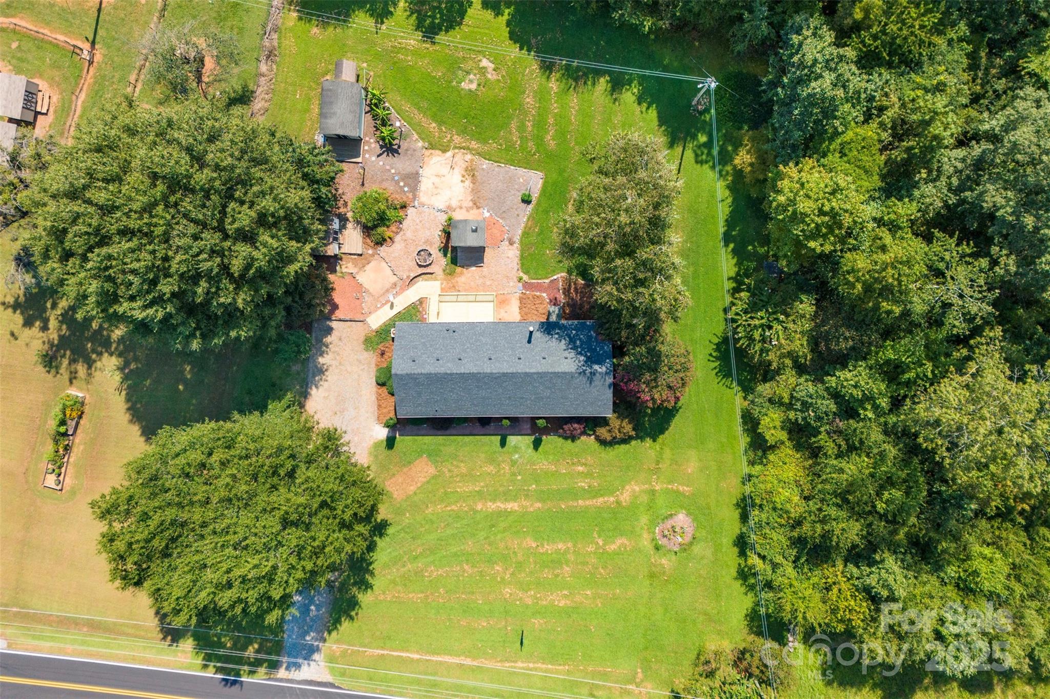 2121 Hephzibah Church Road Bessemer City, NC 28016 - Photo 41 of 41 an aerial view of a house with swimming pool outdoor seating and yard