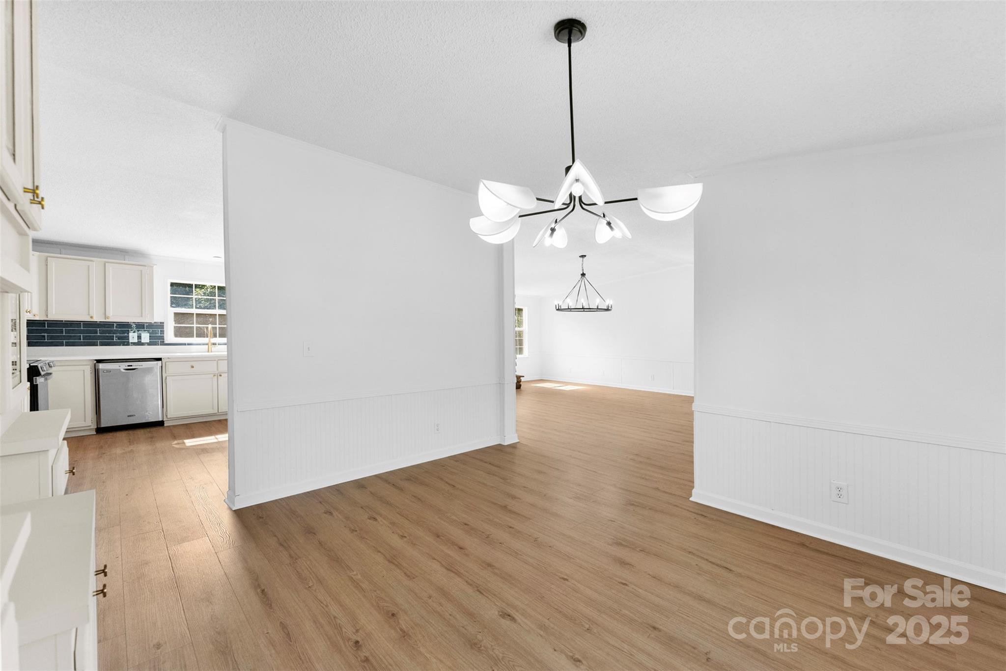 2121 Hephzibah Church Road Bessemer City, NC 28016 - Photo 10 of 41 a view of a kitchen with a sink cabinets and wooden floor
