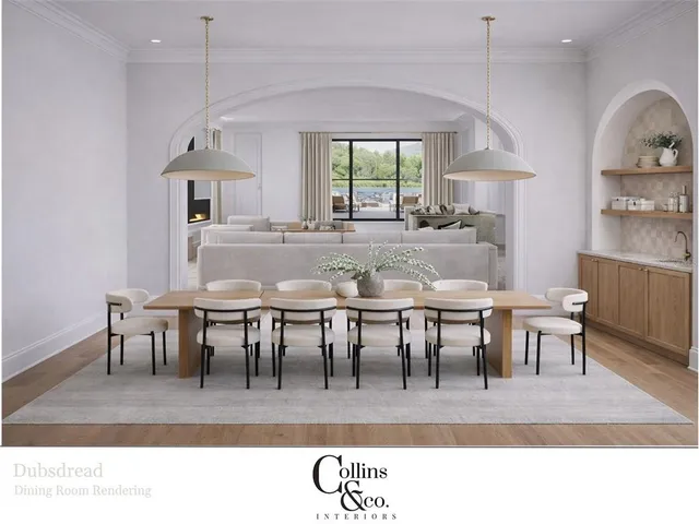 a view of dining room and hall with furniture