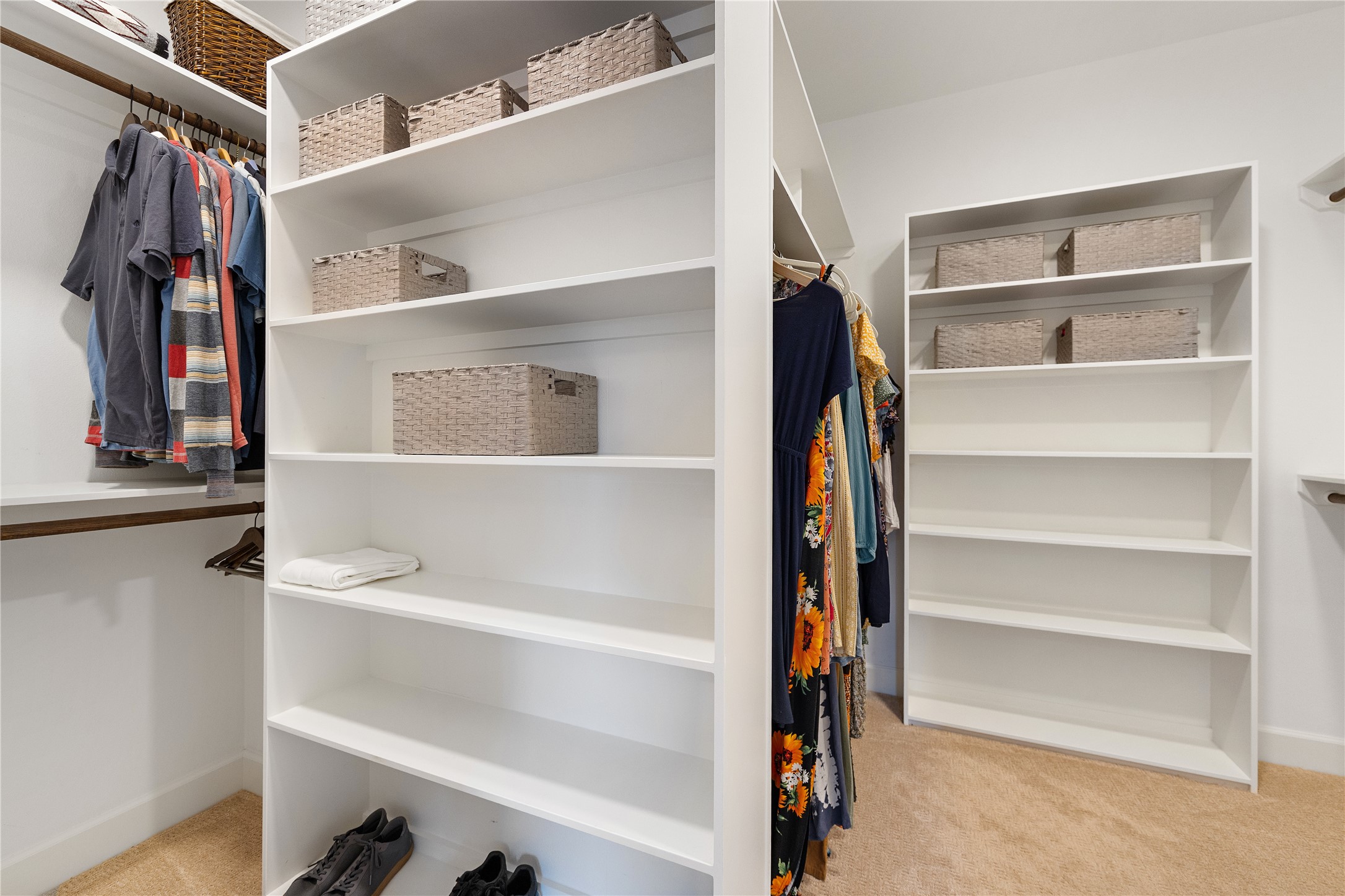 1017 Westland Ridge Road Dripping Springs, TX 78620 - Photo 15 of 40 Custom built-in shelving and soft carpeting define this spacious closet.