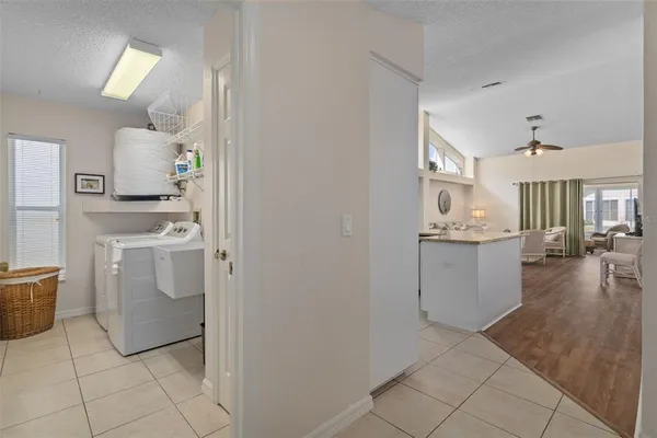 a view of a kitchen with appliances and cabinets