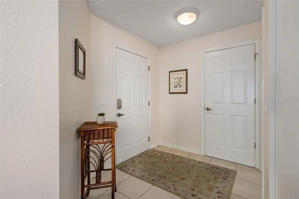 a view of a hallway with entryway