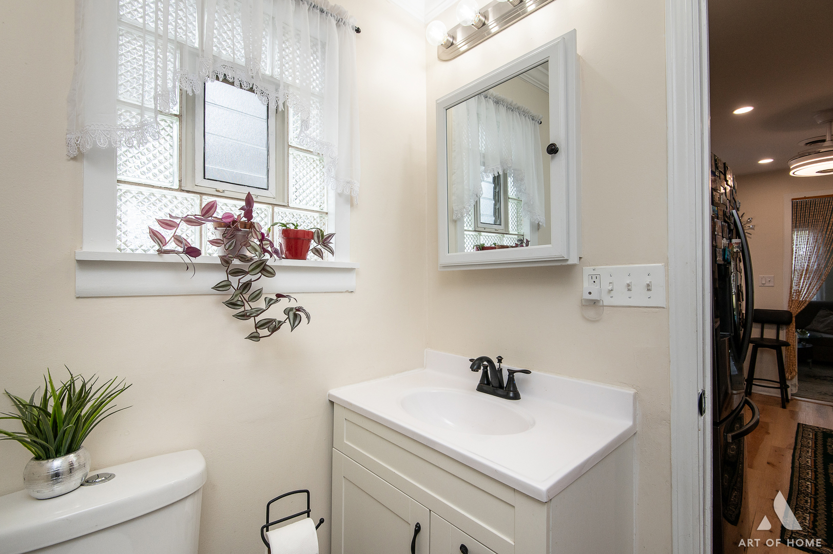 3115 Maple Street Franklin Park, IL 60131 - Photo 13 of 28 a bathroom with a sink and a mirror