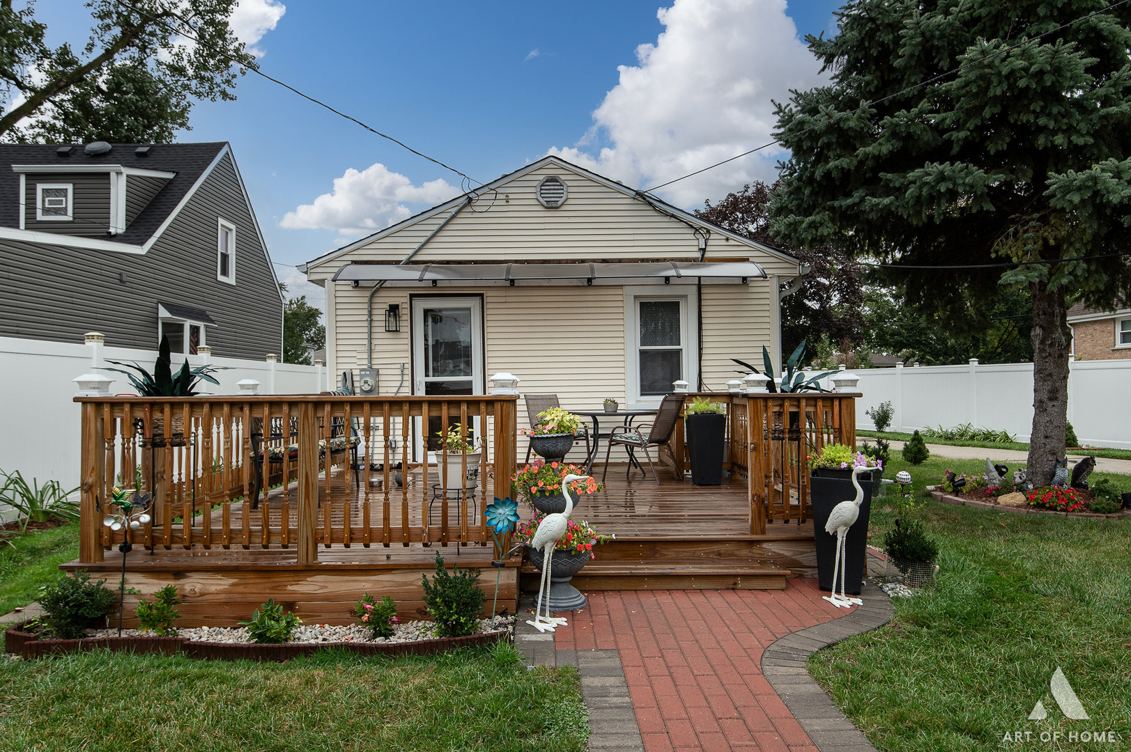3115 Maple Street Franklin Park, IL 60131 - Photo 20 of 28 a front view of a house with garden and sitting area