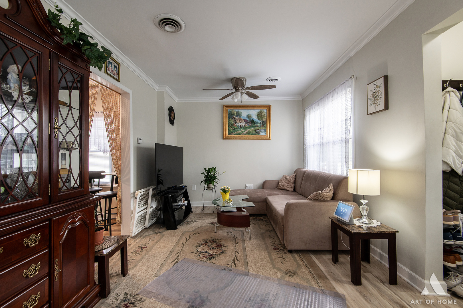 3115 Maple Street Franklin Park, IL 60131 - Photo 9 of 28 a living room with furniture and a flat screen tv
