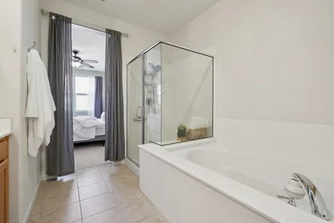 a bed room with a bed and a window