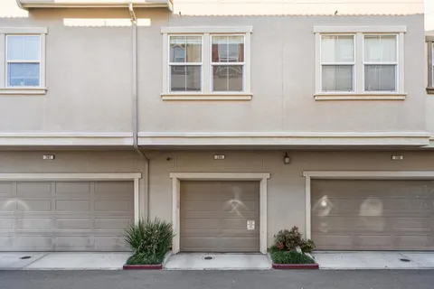 a view of a building with a street