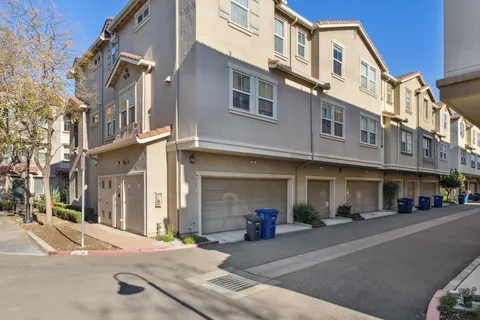 an aerial view of a house with a ocean view
