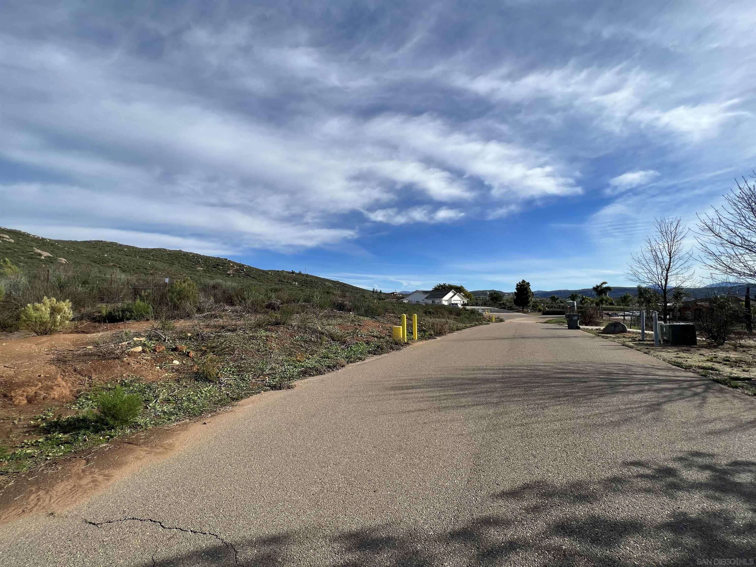 0 Quail Meadow Road Ramona, CA 92065 - Photo 17 of 26 a view of a road with a big yard