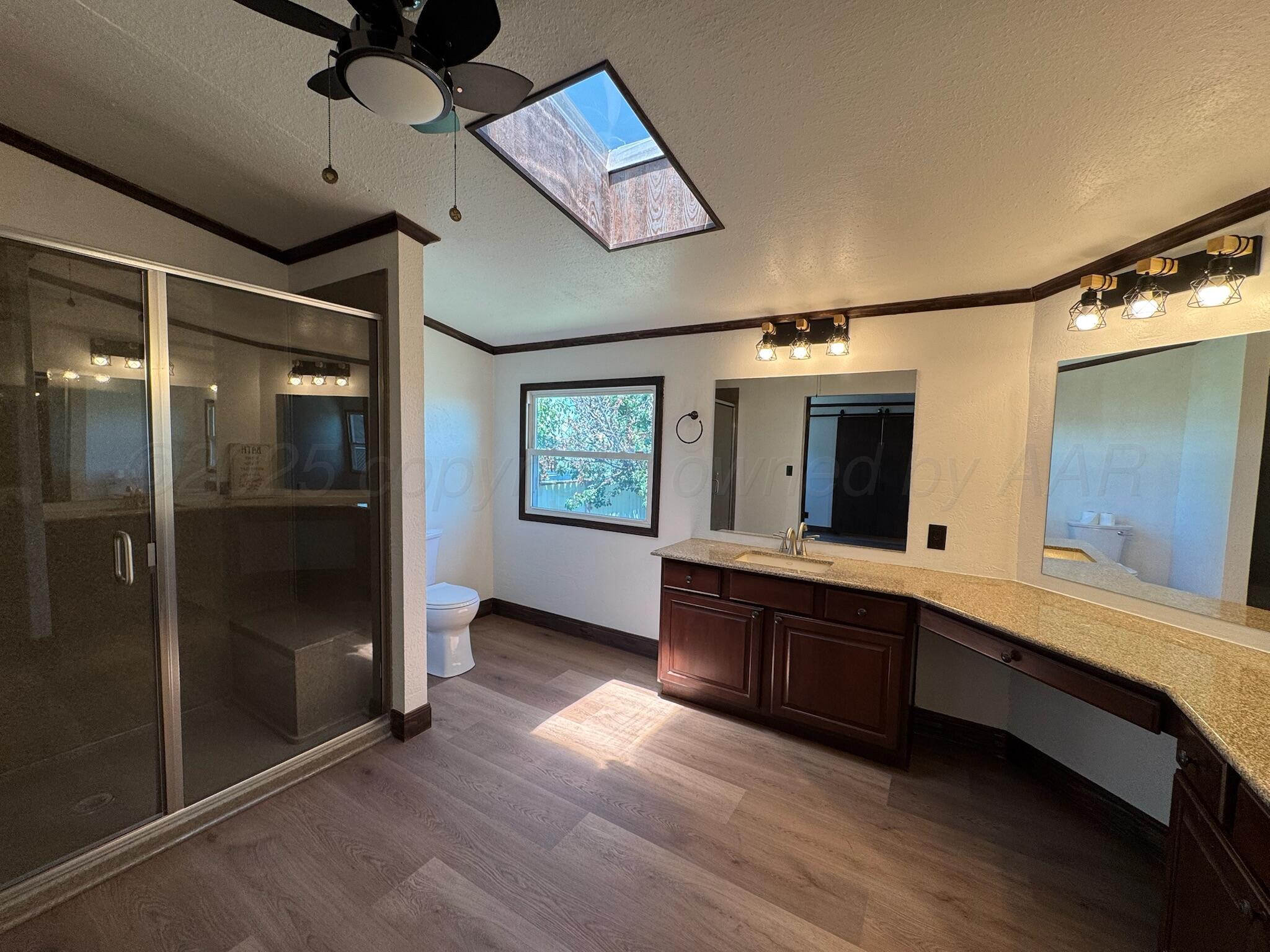 403 Aaron Road Fritch, TX 79036 - Photo 17 of 31 a room with stainless steel appliances kitchen island granite countertop a refrigerator and a sink